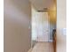 Hallway featuring granite countertops and white doors at 600 Garrison Cove Ln # 2B, Tampa, FL 33602