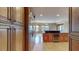 Open concept kitchen featuring an island, a stainless refrigerator, and views of the outdoor balcony at 600 Garrison Cove Ln # 2B, Tampa, FL 33602