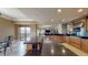 Spacious kitchen with an expansive island, granite countertops, stainless appliances, and a living area view at 600 Garrison Cove Ln # 2B, Tampa, FL 33602