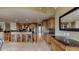 Bright, updated kitchen featuring stone floors, granite countertops, custom cabinets, and stainless steel appliances at 600 Garrison Cove Ln # 2B, Tampa, FL 33602
