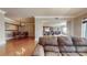 Spacious living room and dining room area with hardwood flooring and lots of natural light at 600 Garrison Cove Ln # 2B, Tampa, FL 33602