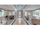 Bright lobby with large windows, stylish seating arrangements, and decorative lighting at 600 Garrison Cove Ln # 2B, Tampa, FL 33602