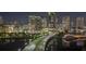 Breathtaking night view of city skyline and waterfront from luxury condominium at 600 Garrison Cove Ln # 2B, Tampa, FL 33602