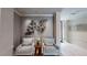 Sitting area with stylish chairs, accent pillows, and modern art decor at 600 Garrison Cove Ln # 2B, Tampa, FL 33602