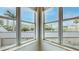 A bright view from a corner window, overlooking rooftops and city buildings at 600 Garrison Cove Ln # 2B, Tampa, FL 33602