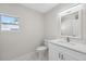 Well-lit bathroom featuring a sleek vanity with modern fixtures and bright natural light at 7313 8Th N Ave, St Petersburg, FL 33710
