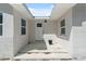 Inviting front entrance with clean lines, fresh paint, and ample natural light at 7313 8Th N Ave, St Petersburg, FL 33710