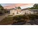 Charming single-story home with a carport, stucco exterior, and well-maintained front yard at 7313 8Th N Ave, St Petersburg, FL 33710