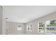 Bright room featuring recessed lighting, neutral walls, multiple windows, and light hardwood flooring at 7313 8Th N Ave, St Petersburg, FL 33710