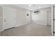 Open room with air conditioning unit, two doors, recessed lighting, and light hardwood flooring at 7313 8Th N Ave, St Petersburg, FL 33710
