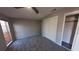 Bedroom with a sliding door closet, modern ceiling fan, and a window with light filtering shades at 7504 Lily Pad Ct, Hudson, FL 34667