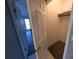 Walk-in closet, featuring rod and shelf, conveniently located near the bedroom door at 7504 Lily Pad Ct, Hudson, FL 34667