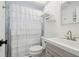 Bright bathroom with modern shower curtain and vanity at 7553 Sequoia Dr, New Port Richey, FL 34653