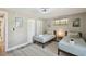 Charming bedroom with twin beds, closet, and window for lots of natural light at 7553 Sequoia Dr, New Port Richey, FL 34653