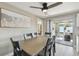 Dining room featuring a large sliding glass door to a screened in patio at 7553 Sequoia Dr, New Port Richey, FL 34653