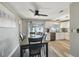 Spacious open-concept dining area and kitchen with modern appliances and lots of light at 7553 Sequoia Dr, New Port Richey, FL 34653