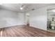 Bright bedroom with hard floors and view to bathroom at 7830 Judith Cres, Port Richey, FL 34668