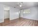 Bright bedroom featuring hard floors and ceiling fan at 7830 Judith Cres, Port Richey, FL 34668