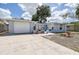 Beautiful one-story home featuring a fresh exterior and a spacious driveway at 7830 Judith Cres, Port Richey, FL 34668