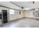 This garage features painted walls and a large amount of open storage space at 7830 Judith Cres, Port Richey, FL 34668