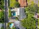 Aerial view of the property highlighting the pool, carport, and well-manicured yard at 818 37Th Ne Ave, St Petersburg, FL 33704