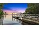 Scenic view of a boat ramp with calm waters and a beautiful sunset backdrop at 818 37Th Ne Ave, St Petersburg, FL 33704