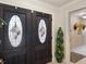 Elegant entryway with decorative double doors with stained glass accents at 8305 Palma Vista Ln, Tampa, FL 33614