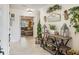 Inviting foyer with decorative console table and a glimpse into the living room at 8305 Palma Vista Ln, Tampa, FL 33614