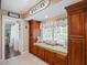 Bright kitchen nook with a window seat and storage cabinets, perfect for cozy seating and relaxing at 8305 Palma Vista Ln, Tampa, FL 33614
