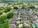 Aerial view of house in established neighborhood with tree-lined streets at 838 Vino Verde Cir, Brandon, FL 33511
