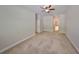 Bedroom showcasing neutral walls, carpeted floor, open door, and a closet at 838 Vino Verde Cir, Brandon, FL 33511