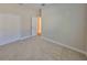 Neutral bedroom with carpet, closet, and a doorway leading to the rest of the home at 838 Vino Verde Cir, Brandon, FL 33511
