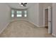 Bedroom featuring neutral walls, carpeted floor, ceiling fan and natural light at 838 Vino Verde Cir, Brandon, FL 33511