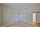 A bright bedroom with neutral carpet and a window overlooking the backyard at 838 Vino Verde Cir, Brandon, FL 33511