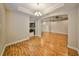 Bright dining room featuring hardwood floors, chandelier, and open concept design at 838 Vino Verde Cir, Brandon, FL 33511
