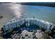 Aerial view of a condo community with plenty of parking and beautiful waterfront access at 8800 Bay Pines Blvd # 303, St Petersburg, FL 33709
