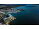 Aerial view of waterfront condos with bay views and community pool at 8800 Bay Pines Blvd # 303, St Petersburg, FL 33709