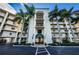 The entrance to Boca Ciega is beautifully framed by palm trees, and landscaping at 8800 Bay Pines Blvd # 303, St Petersburg, FL 33709