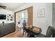 Comfortable living space that includes both dining and living room and access to the outdoor patio at 8800 Bay Pines Blvd # 303, St Petersburg, FL 33709