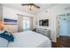 Main bedroom featuring neutral colors and a ceiling fan at 8800 Bay Pines Blvd # 303, St Petersburg, FL 33709