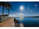 Waterfront brick walkway with a white fence along the bay at 8800 Bay Pines Blvd # 303, St Petersburg, FL 33709