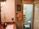 Bathroom featuring a vanity with granite countertops and a separate toilet room for added privacy at 8810 41St N St, Pinellas Park, FL 33782