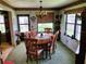 Traditional dining room with natural light, chandelier, and seating for six at 8810 41St N St, Pinellas Park, FL 33782