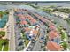 Aerial view of waterfront condos, pool, boat docks and parking area in Madeira Beach, Florida at 337 Rex Pl # E, Madeira Beach, FL 33708