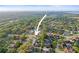 An aerial view of a well-maintained home surrounded by lush greenery and community amenities at 10812 96Th St, Largo, FL 33773