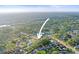 Aerial view of the home, showcasing its location in a tree-lined neighborhood at 10812 96Th St, Largo, FL 33773