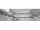 Organized closet with wire shelving and hanging space for optimal storage solutions at 10812 96Th St, Largo, FL 33773