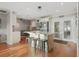 Bright, open kitchen with a large island, stainless steel appliances, and access to the outdoor area at 10812 96Th St, Largo, FL 33773