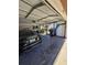 A peek into the two-car garage, complete with vehicle, storage and access to the home at 10825 Venice Cir, Tampa, FL 33635