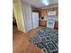 Well-lit kitchen with white appliances, wood cabinets, and plenty of counter space at 10825 Venice Cir, Tampa, FL 33635